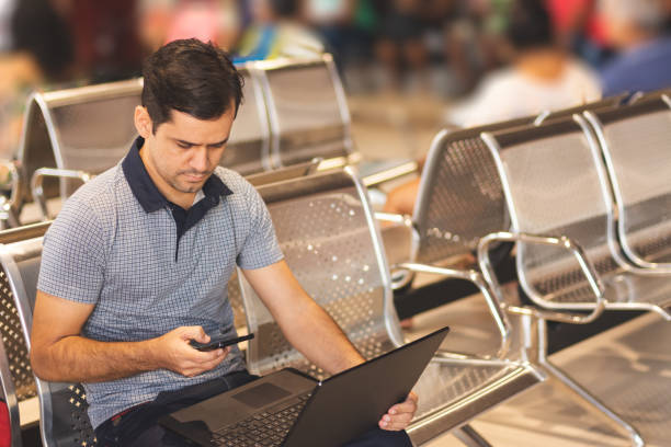 istock Traveler working connected while wait for boarding time at river terminal (hidroviario, in portuguese) in Belem do Para 1072099264