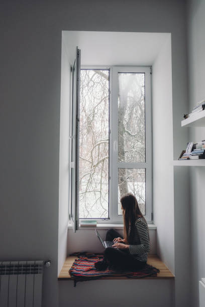 istock Woman working by laptop at home 1072106050