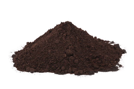Pile heap soil humus isolated over a white background.