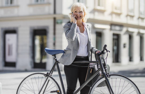 istock Businesswoman Commuting To Work By Bicycle 1072110090