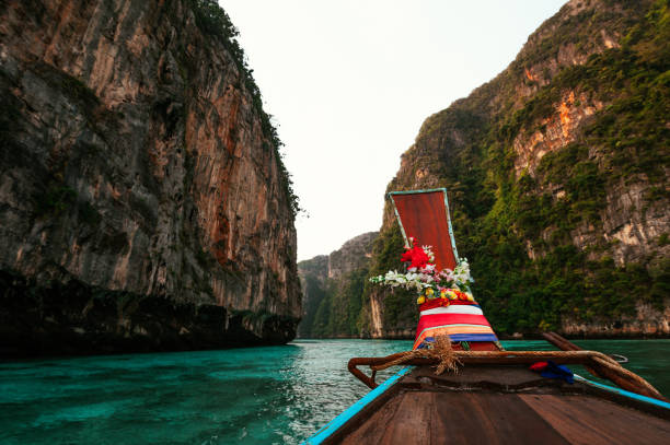 istock Old wooden boat on beautiful Asian Islands 1072113132