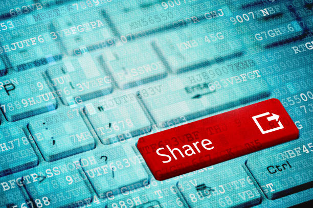 istock Red key with text Share on blue digital laptop keyboard 1072113172