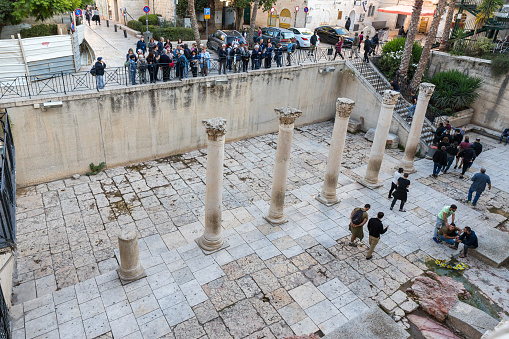 Jerusalem, Israel, November 17, 2018 : Numerous tourists visiting the remains of Cardo street in old city of Jerusalem, Israel