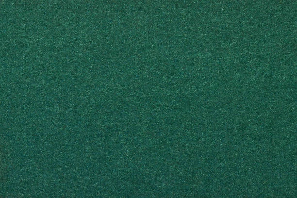 istock green dark background texture metal paper 1072118284