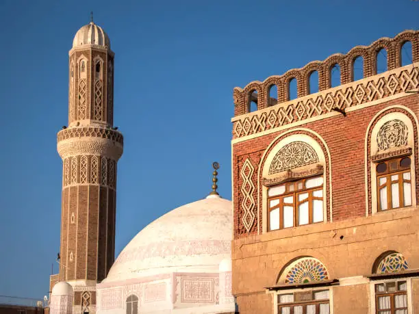 The minaret, dome and ornate windows of the Abbas Mosque in the Old City of Sana'a, Yemen