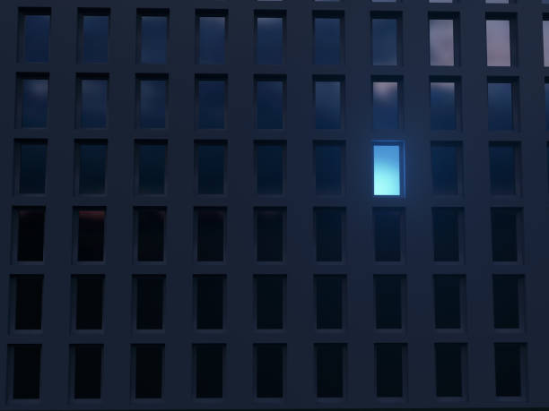 istock lonely luminous window in a dark house 1072123154