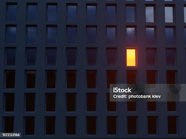 Lonely Luminous Window In A Dark House Stock Photo - Download Image Now - Night, Building Exterior, Window