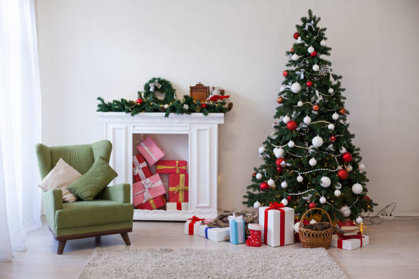 istock Christmas background Interior new year tree gifts winter postcard 1072128982
