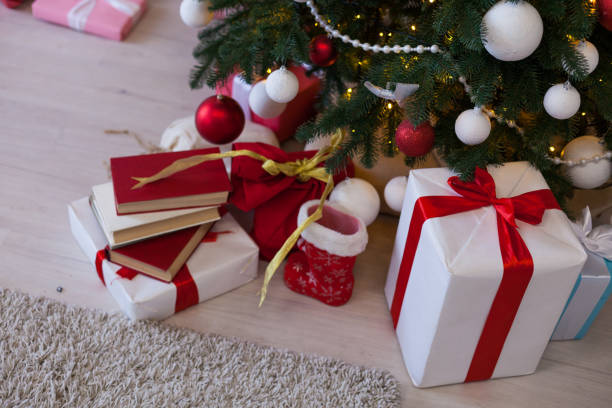 istock Christmas background Interior new year tree gifts winter postcard 1072129402