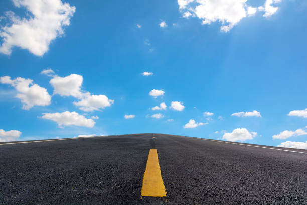 istock The road and Blue sky for background. 1072129874