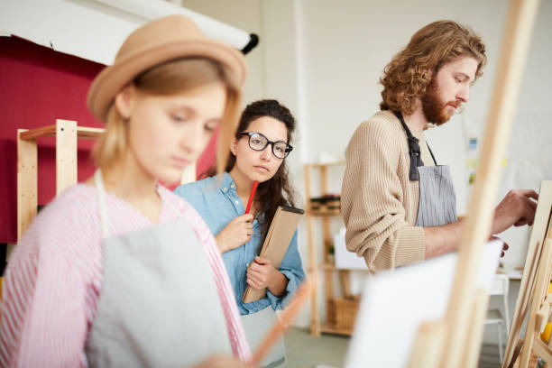 istock Teacher of painting 1072131206