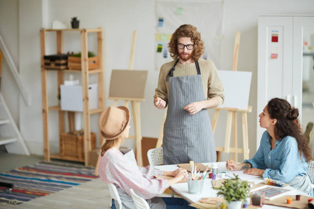 istock Teacher of painting 1072131318