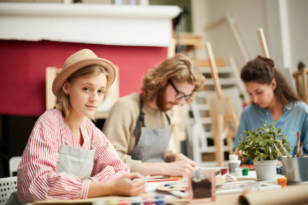 istock Girl painting in studio 1072131370