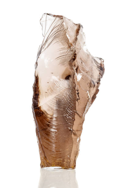 istock Macro mineral stone Smoky quartz, rauchtopaz on a white background 1072132940