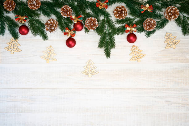 istock Christmas decorations on wooden background. 1072133402