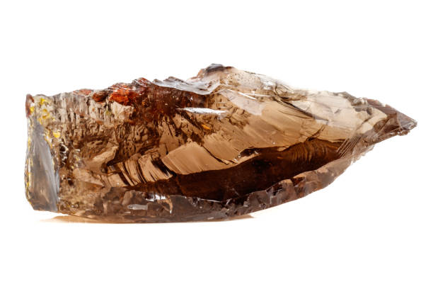 istock Macro mineral stone Smoky quartz, rauchtopaz on a white background 1072135018