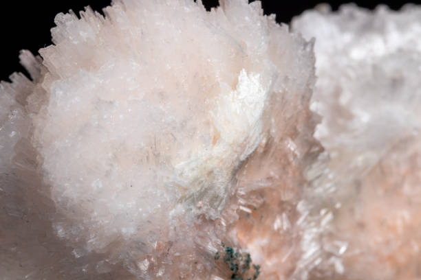 istock Macro mineral Scolecite stone on a black background 1072138444