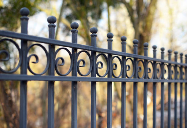 istock Decorative metal fence with artistic forging. 1072138650