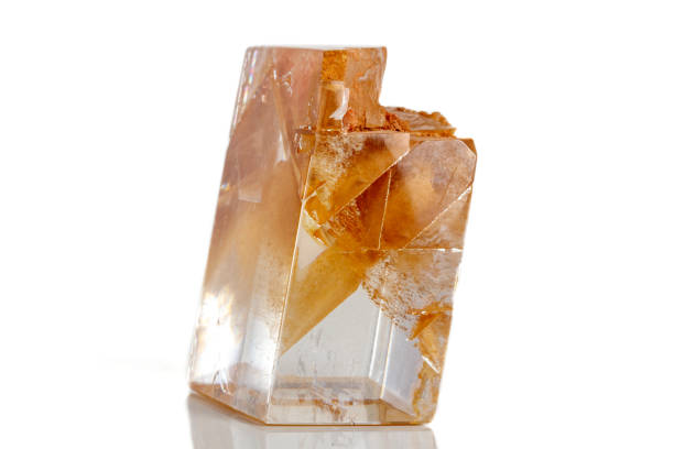 istock Macro mineral stone Calcite on a white background 1072140236