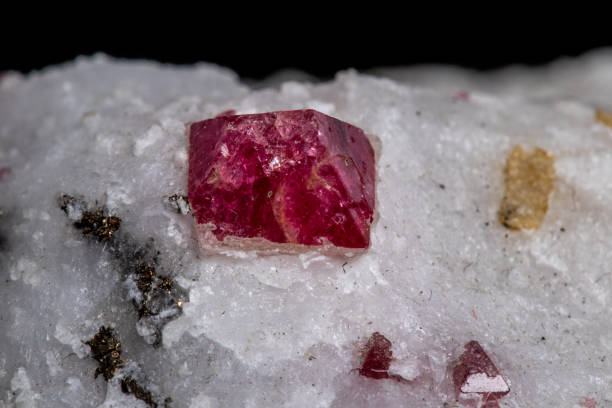 istock Macro mineral stone Spinel on a black background 1072140646
