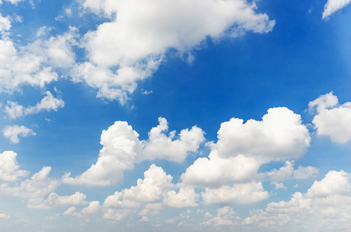 Summer Blue Sky and white cloud white background. Beautiful clear cloudy in sunlight calm season. Panoramic vivid cyan cloudscape in nature environment. Outdoor horizon skyline with spring sunshine.
