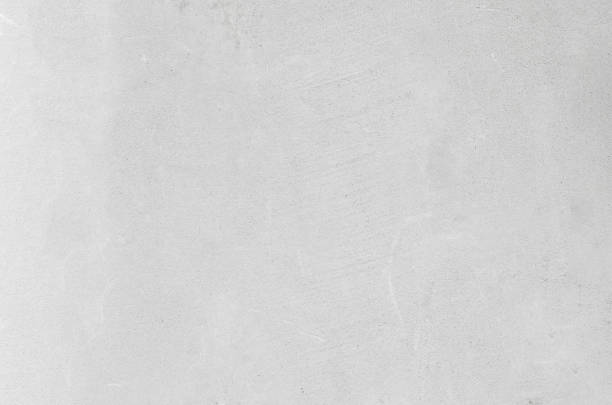 istock gray concrete background texture clean stucco fine grain cement wall clear and smooth white polished. 1072140992