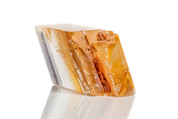 istock Macro mineral stone Calcite on a white background 1072142992