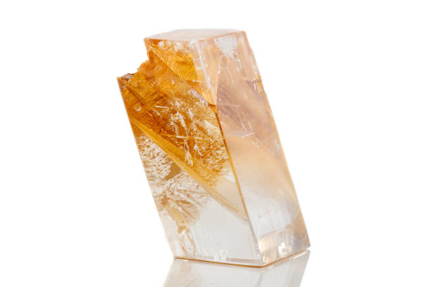 istock Macro mineral stone Calcite on a white background 1072143700