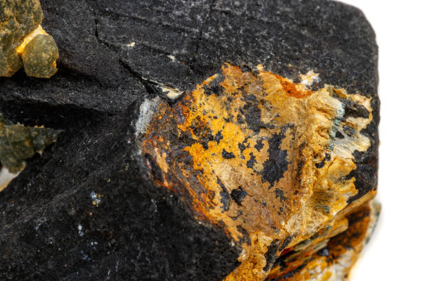 istock Macro mineral stone Quartz Hedenbergite Prase on ilvite on a white background 1072143766