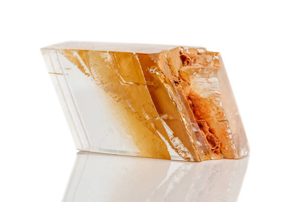 istock Macro mineral stone Calcite on a white background 1072143796