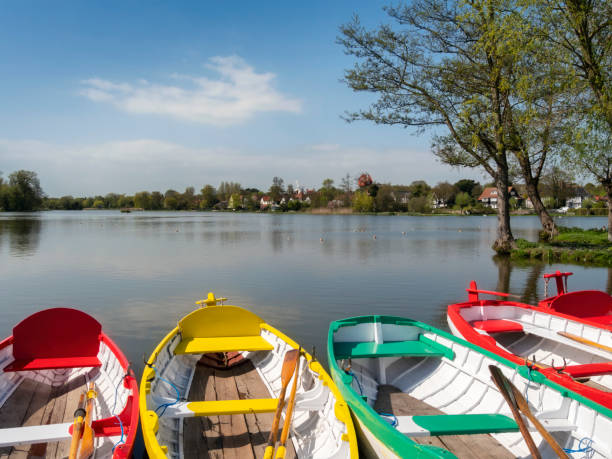 istock View with rowing boats over Thorpeness Meare, Suffolk 1072152918