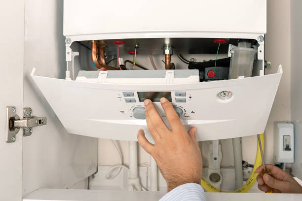 istock Technician repairing combi Gas Boiler 1072158430