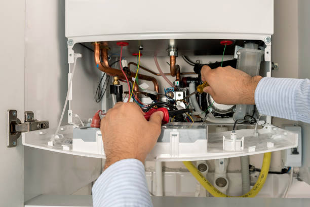 istock Technician repairing combi Gas Boiler 1072158524