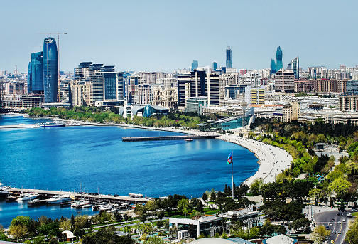 Aerial view coastline of Baku with with numerous modern high-rise buildings.Baku is the capital and largest city of Azerbaijan, as well as the largest city on the Caspian Sea