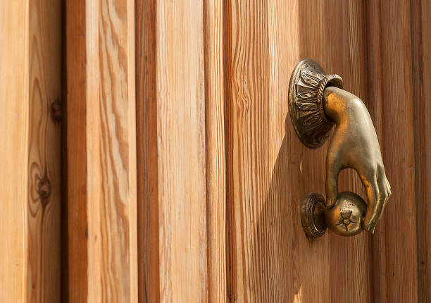 istock wooden door with aldabon 1072168572