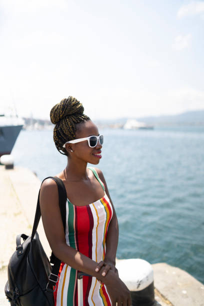 istock Elegant african woman at harbor 1072169120