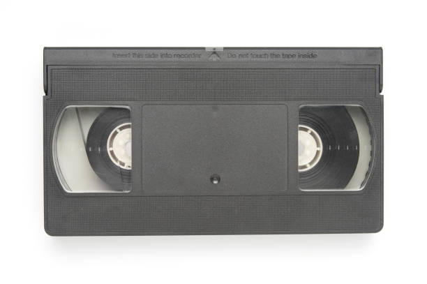 istock Video tape cassette closeup on white background 1072173862