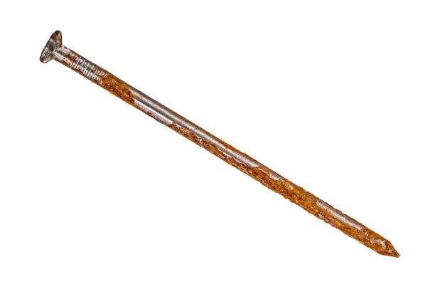 istock Rusty nail close up isolated on white background 1072174108