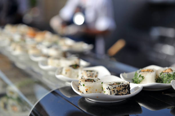 istock Kinds of sushi on narrow white plates. 1072174538