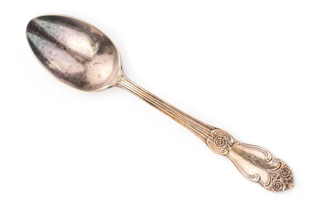 istock Old vintage spoon close up on white background 1072175670