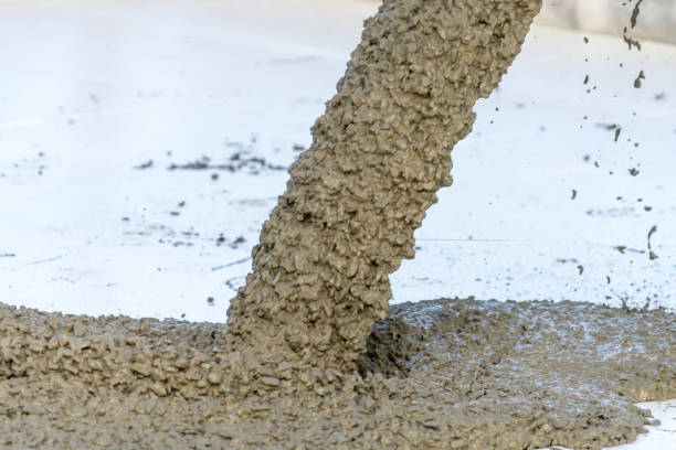 istock Pouring concrete Foundation. Slab Foundation. Place for your text. 1072176788