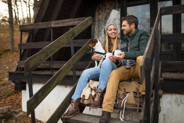 istock Cute Couple On Camping With Their Dog 1072177486