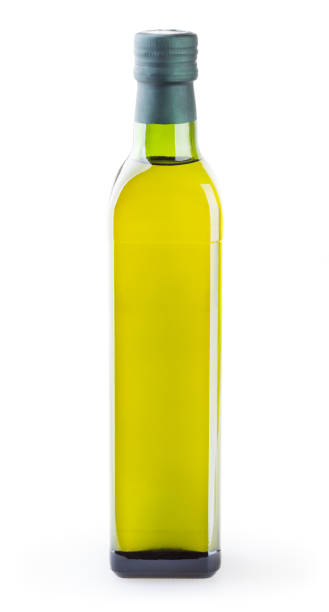 istock Olive oil in glass bottle isolated on white background with clipping path 1072179708