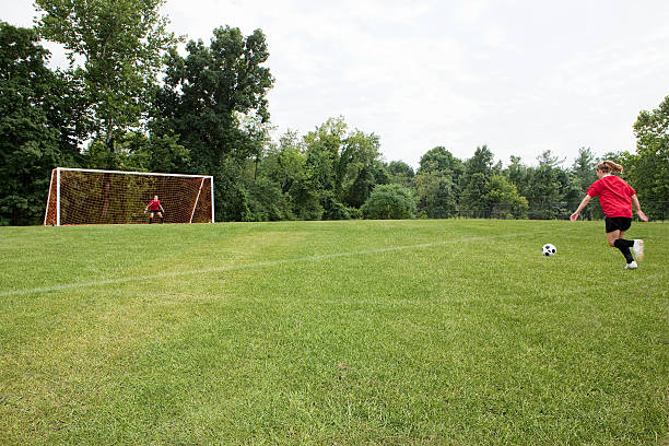 Girls playing soccer  teen goalie stock pictures, royalty-free photos & images