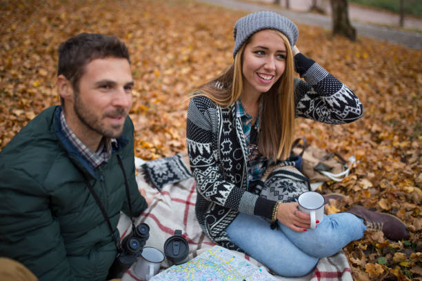 istock Young couple planning their trip with map 1072180550