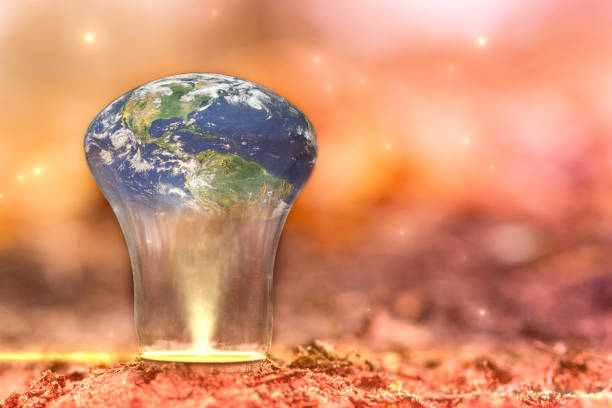 istock Ecology concept with copy space. Earth planet in light bulb. Global world innovation. Autumn background. 1072182780