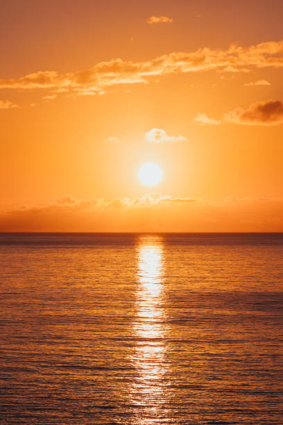 istock sunrise at ocean seascape with reflection 1072183956