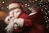 Santa Claus with finger on the lips