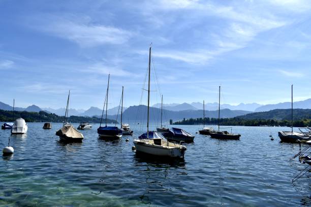 istock Sailboats, Mountains, and Clear Water 1072186060
