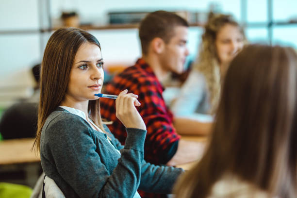 istock Thoughtful college student during a class in the classroom. 1072186378